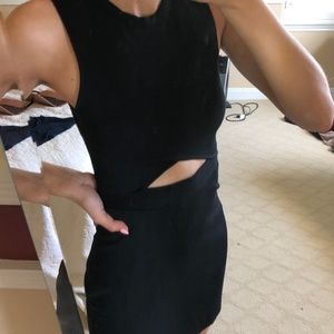 black bodycon dress with slit in the middle